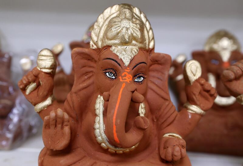 DUBAI, UNITED ARAB EMIRATES , August 17 – 2020 :- Eco friendly Ganesh idols made by clay on display at the Madhoor store in Bur Dubai in Dubai. Ganesh Festival will start on 22nd August. . Authorities in the UAE are advising the Indian community to limit the number to immediate family members to prevent the spread of the coronavirus. These Ganesh statues made by clay and can be immersed at home as part of the ritual observed during the Ganesh festival. (Pawan Singh / The National) For News/Online/Instagram. Story by Ramola