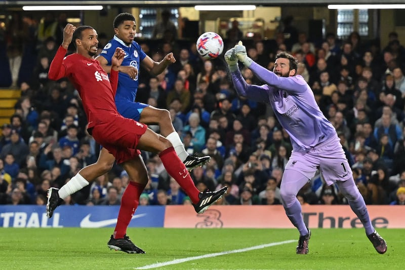 LIVERPOOL RATINGS: Alisson 7 - Denied Kai Havertz in the first half with a strong save from close range. Saved again from the Germany international after the break, with a handball deflection helping him maintain his clean sheet. 

AFP
