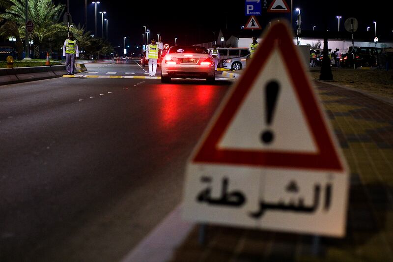 15/04/09 - Abu Dhabi, UAE -  Police patrol the Breakwater in Abu Dhabi targeting young drivers on April 15, 2009.  (Andrew Henderson/The National) *** Local Caption ***  ah_090415_Police_0103.jpg