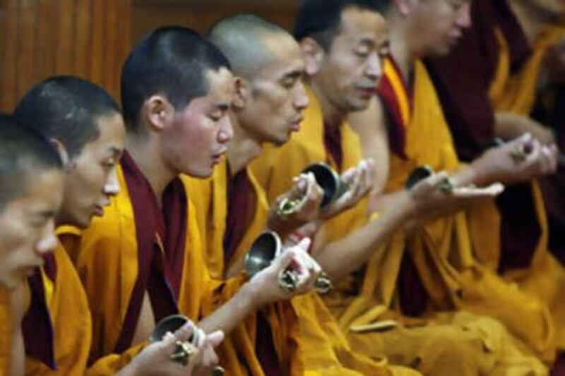 Tibetan monks in exile offer prayers at the Tsuglakhang Temple in Dharamshala today. Leading Tibetan exiles gathered in India ahead of a week of discussions that could transform how the movement pursues its decades-old struggle with Chinese rule in Tibet.