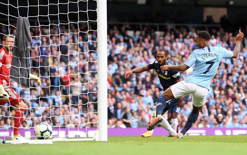 Raheem Sterling of Manchester City scores his team's third goal during the victory over Fulham - their 34th unbeaten match in a row against promoted teams at the Etihad Stadium. Getty Images