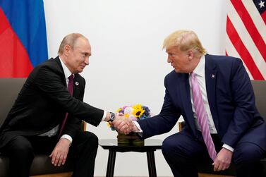  Russia's President Vladimir Putin and U.S. President Donald Trump shake hands during a bilateral meeting at the G20 leaders summit in Osaka, Japan, June 28, 2019 Reuters
