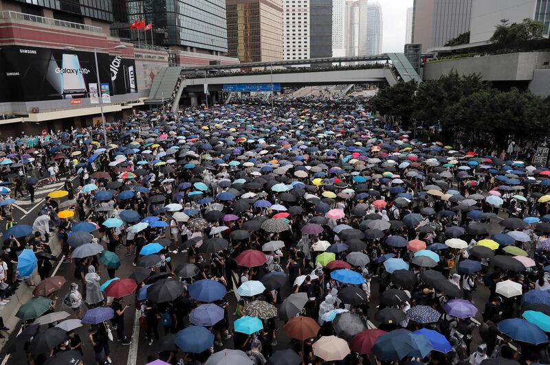 Protesters gather near the Legislative Council. AP