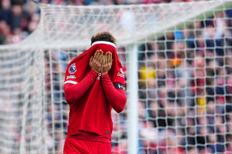 Liverpool's Curtis Jones reacts after missing a scoring chance. AP 