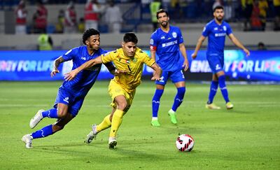 Al Wasl, in yellow, in action against Al Nasr during the Bur Dubai Derby. Photo: Pro League