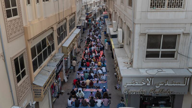 Thousands of people end their fast daily at the Lootah mosque in Deira. Photos: Antonie Robertson / The National