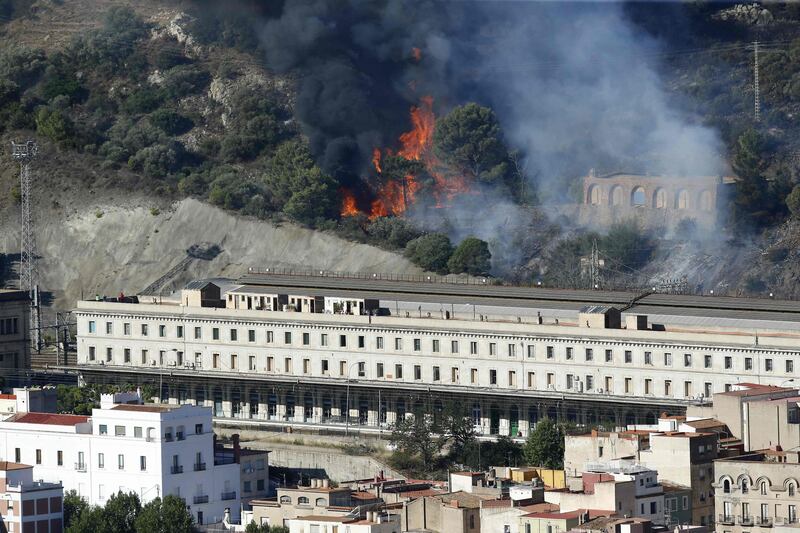 A fire fanned by strong winds on the outskirts of Portbou in Spain, near the French border. AFP