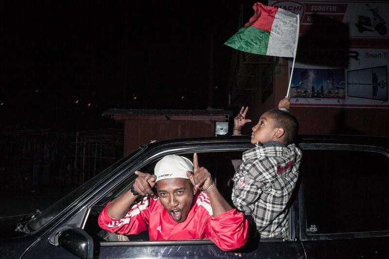 Madagascar fans celebrate on the streets of Antananarivo. AFP
