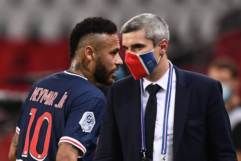 Brazilian forward Neymar leaves the pitch after his red card. AFP