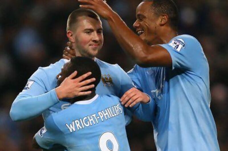 Michael Johnson, formerly of Manchester City, shown here celebrating with teammates after scoring a goal in 2009, was released by the club in December.