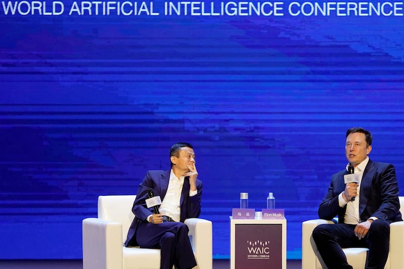 Tesla Inc CEO Elon Musk and Alibaba Group Holding Ltd Executive Chairman Jack Ma attend the World Artificial Intelligence Conference (WAIC) in Shanghai, China, August 29, 2019. REUTERS/Aly Song     TPX IMAGES OF THE DAY