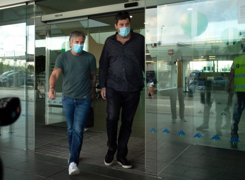 Jorge Messi (L) arrives at El Prat Airport in Barcelona. EPA