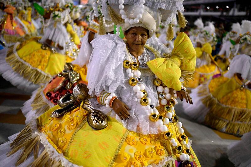 Members of the Grande Rio samba school perform during the first night of Rio's carnival parade. AFP
