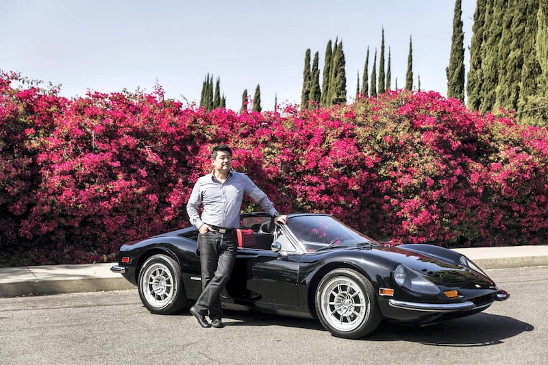 David Lee, 51, a watch-and-jewelery business owner, and his 'outlawed' Ferrari Dino. Emily Berl/Bloomberg