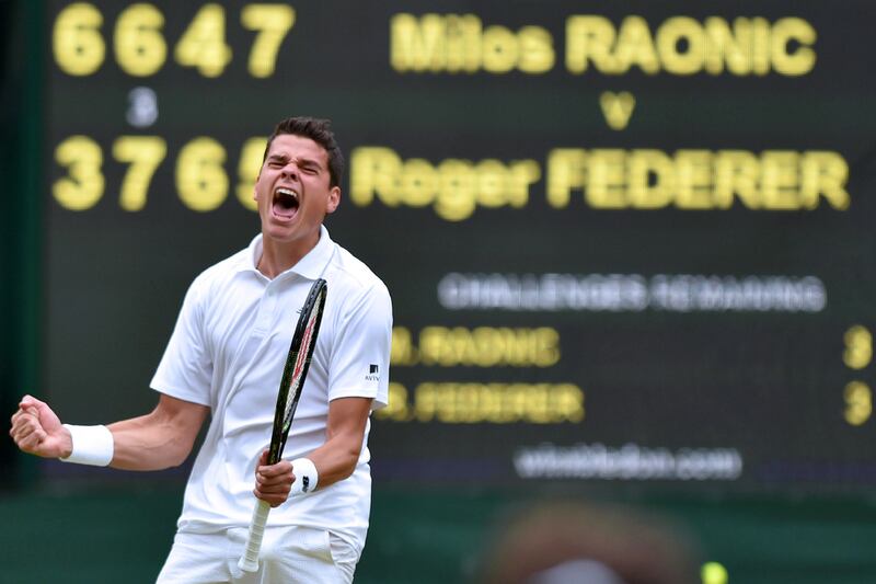 Canada's Milos Raonic celebrates beating Switzerland's Roger Federer during their men's semi-final match at Wimbledon. Glyn Kirk / AFP