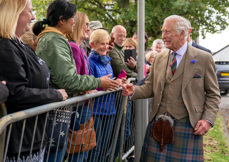 The king meets members of the public in the Scottish town. Reuters