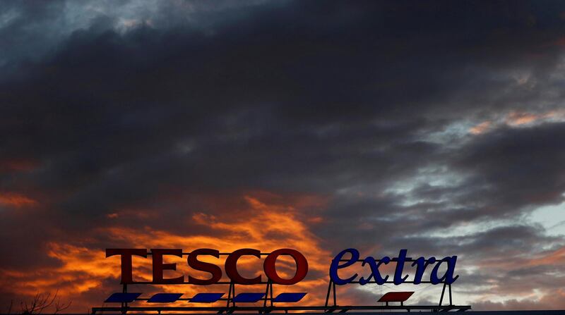 FILE PHOTO: A company logo is pictured outside a Tesco supermarket in Altrincham northern England, April 16, 2016. REUTERS/Phil Noble/File Photo
