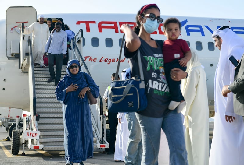 Evacuees arrive at Abu Dhabi International Airport
