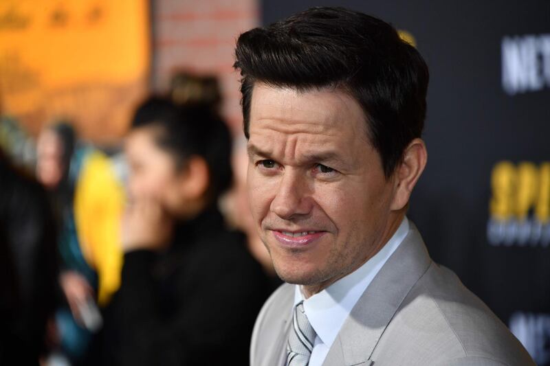 (FILES) In this file photo taken on February 27, 2020 US actor Mark Wahlberg arrives for the premiere of Netflix's "Spenser Confidential" at Regency Village Theatre in Westwood, California. Mark Wahlberg interrupted his famously punishing daily workout regimen to hone his heartfelt new anti-bullying movie, its director told AFP as the film premiered in Toronto on September 14, 2020. / AFP / Mark RALSTON
