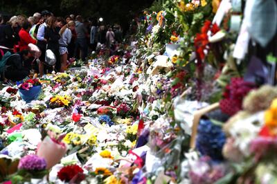 CHRISTCHURCH, NEW ZEALAND - MARCH 18:  Flowers and tributes are laid at the Botanic Gardens on March 18, 2019 in Christchurch, New Zealand. 50 people are confirmed dead, with with 36 injured still in hospital following shooting attacks on two mosques in Christchurch on Friday, 15 March. 41 of the victims were killed at Al Noor mosque on Deans Avenue and seven died at Linwood mosque. Another victim died later in Christchurch hospital. A 28-year-old Australian-born man, Brenton Tarrant, appeared in Christchurch District Court on Saturday charged with murder. The attack is the worst mass shooting in New Zealand's history. (Photo by Hannah Peters/Getty Images)