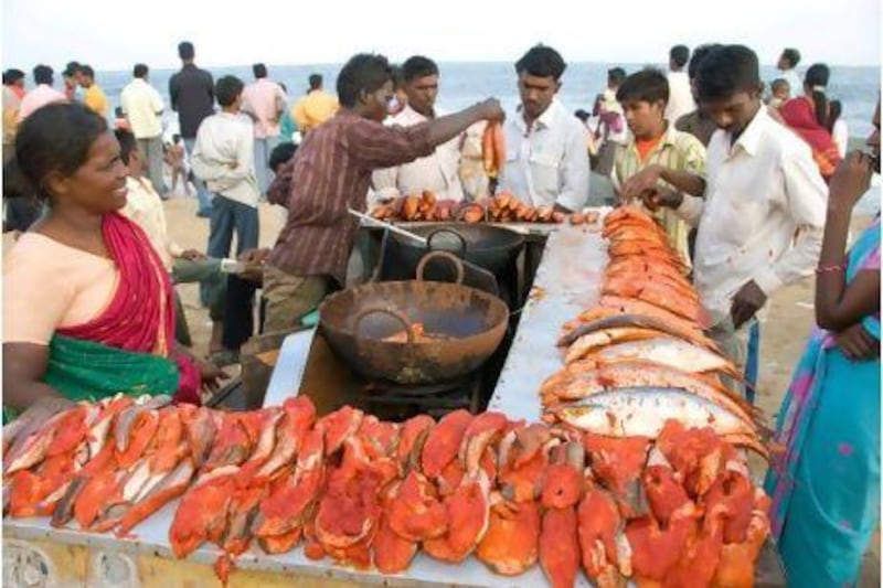 From vendors selling freshly cooked fish to yoga lessons, there's always a lot going on at Marina beach.
