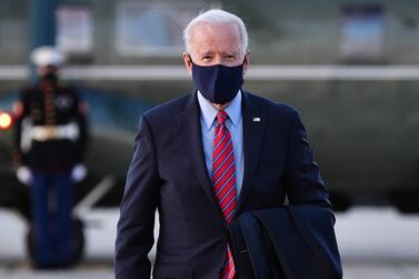 US President Joe Biden makes his way to board Air Force One before departing from Andrews Air Force Base in Maryland on February 5, 2021. AFP