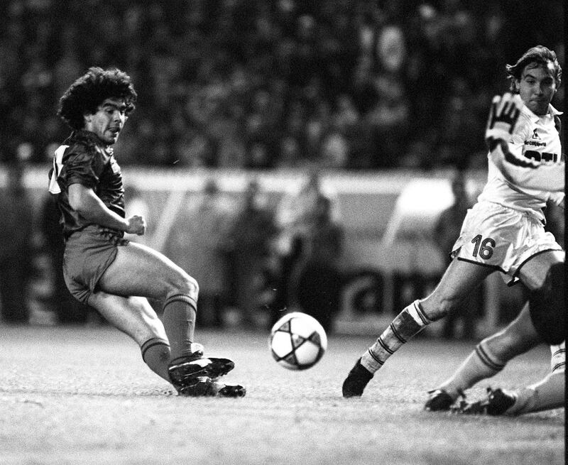 Picture showing Argentinian soccer player Diego Maradona wearing the color of FC Barcelone, during a friendship match against Paris Saint Germain,13 November 1982, in Paris. (Photo by JOEL ROBINE / AFP)