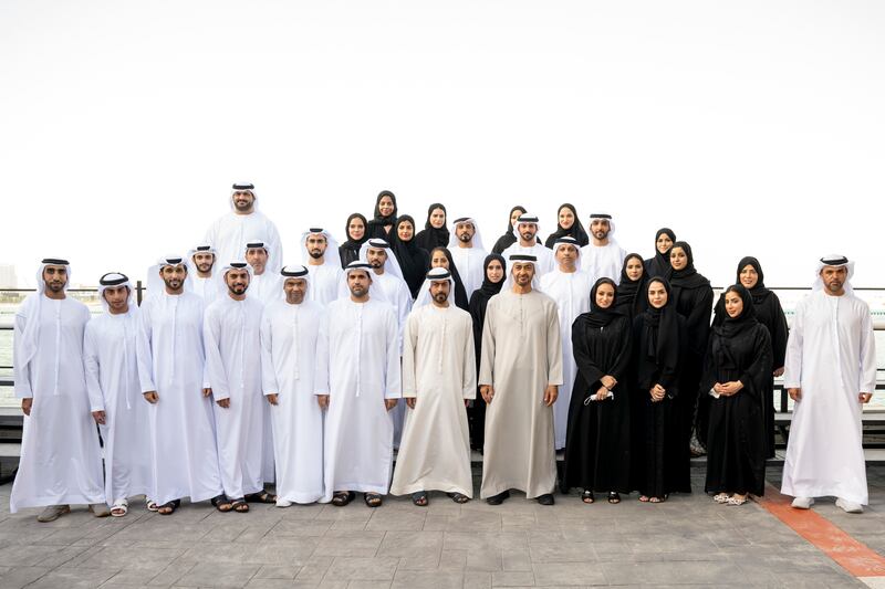 Sheikh Mohamed with Sheikh Khalifa bin Tahnoon and members of the martyr's office at the Sea Palace.