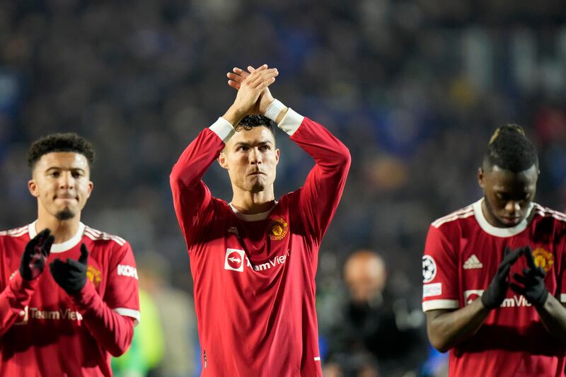 Manchester United's Cristiano Ronaldo, centre, applauds the fans at the end of the match. AP Photo