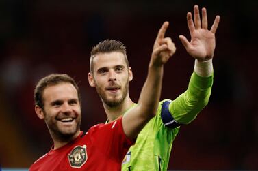 Soccer Football - International Champions Cup - Manchester United v AC Milan - Principality Stadium, Cardiff, Britain - August 3, 2019 Manchester United's David De Gea and Juan Mata after the penalty shootout Action Images via Reuters/John Sibley