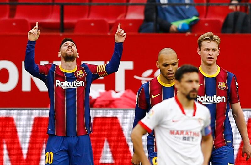 Barcelona's Lionel Messi celebrates scoring their second goal in a 2-0 win against Sevilla at the Ramon Sanchez Pizjuan Stadium on Saturday, February 27. Reuters