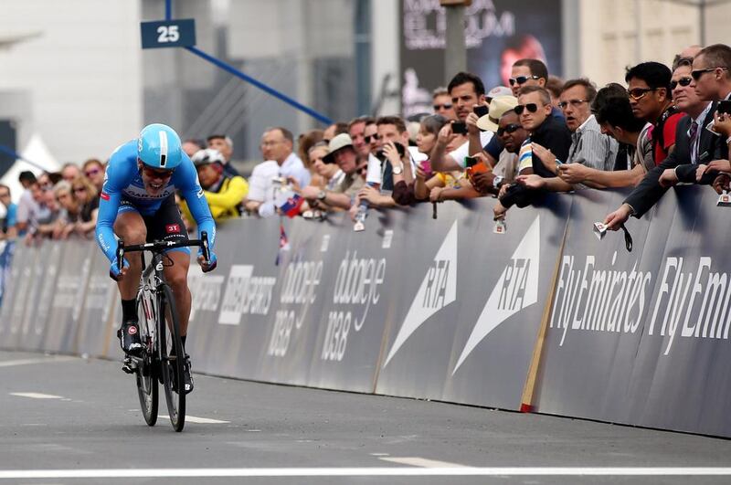 Danish rider Lasse Norman Hansen of Garmin Sharp reaches the finish line during the first stage of the Dubai Tour cycling race, a 9.9 km individual time trial, in Dubai on Wednesday. Ali Haider / EPA