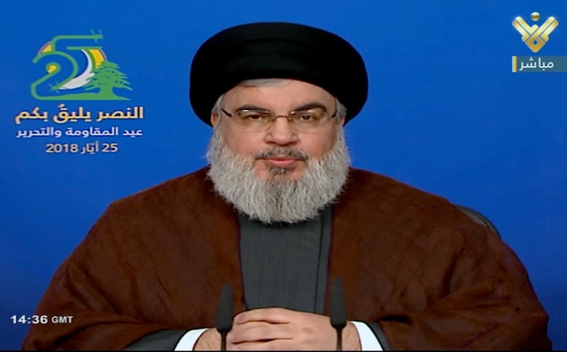 epa06763209 A TV grab made from a handout video made available by al-Manar TV shows Hezbollah's Secretary General Hassan Nasrallah delivering a speech on the occasion of the so-called Resistance and Liberation Day in Beirut, Lebanon, 25 May 2018.  Nasrallh gave a speech to mark the 18th anniversary of Israel's withdrawal from southern Lebanon and warned Israel that Hezbollah will win a possible war.  EPA/AL-MANAR TV / HANDOUT  HANDOUT EDITORIAL USE ONLY/NO SALES HANDOUT EDITORIAL USE ONLY/NO SALES