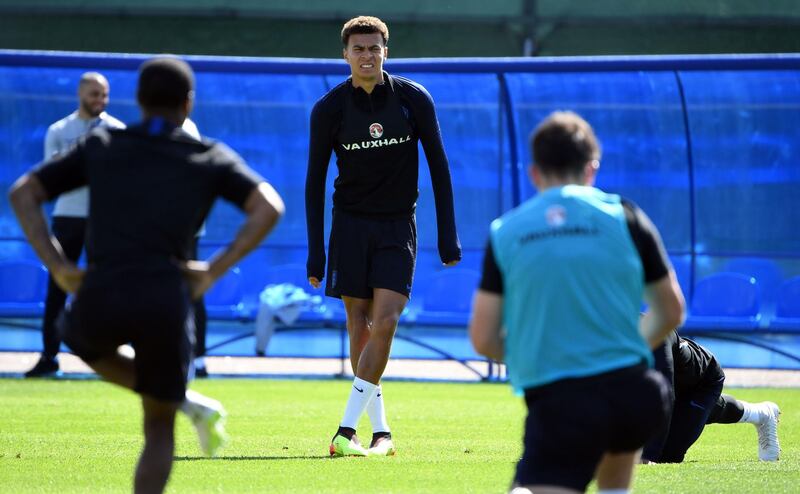 England's midfielder Dele Alli stands on the pitch during a training session in Repino, Russia on June 23, 2018 on the eve of their Russia 2018 World Cup Group G football match between England and Panama at the Nizhny Novgorod Stadium. / AFP / Paul ELLIS
