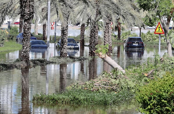 Cars stuck in floods in Al Furjan, Dubai, after heavy rain on April 16. Pawan Singh / The National