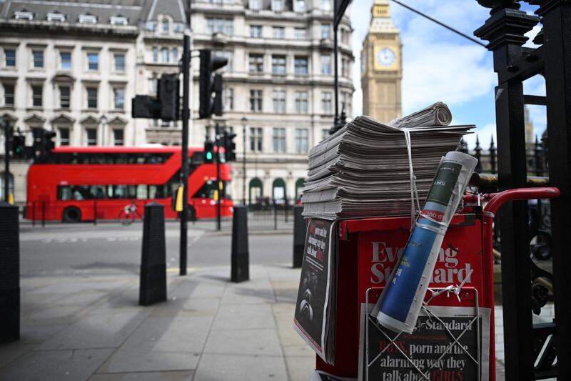 A news stand displays copies of the free London newspaper the Evening Standard in central London on May 29. AFP
