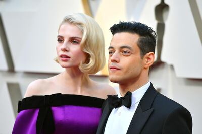 Lucy Boynton, left, and Rami Malek arrive at the Oscars on Sunday, Feb. 24, 2019, at the Dolby Theatre in Los Angeles. (Photo by Jordan Strauss/Invision/AP)
