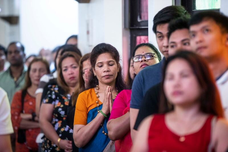 Catholics attend Easter Mass at St Mary’s Church in Oud Metha, Dubai. Ruel Pableo for The National
