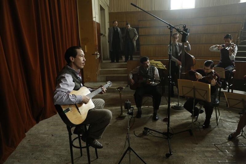 Reda Kateb as Django Reinhardt in Etienne Comar’s movie Django, set during a less-­documented two-year period of his life during the Second World War. Roger Arpajou