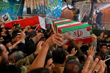 Mourners carry the coffins of Iran's top general Qassem Suleimani and Abu Mahdi Al Muhandis, deputy commander of Iran-backed militias in Iraq known as the Popular Mobiliztion Forces, during their funeral in the shrine of Imam Hussein in Karbala, Iraq. AP