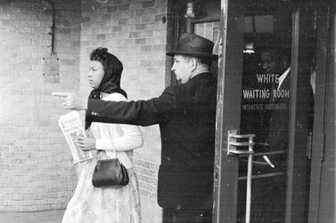 25th May 1961: A black woman is directed away from the 'white waiting room' at Jackson, Mississippi. She has arrived on the 'Freedom Bus' to protest against the racial segregation of passengers on the nation's buses. Getty Images