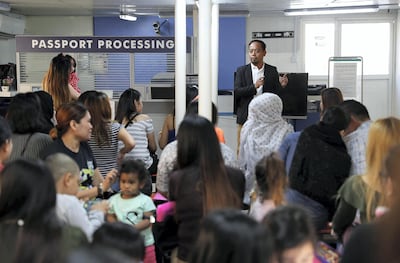
DUBAI , UNITED ARAB EMIRATES , FEB 02 – 2018 :- Arthur Blais, Social worker giving guidance to the jobless parents at the Philippine consulate in Al Qusais 3 in Dubai. (Pawan Singh / The National) For News. Story by Ramola 

