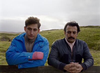 In this image made from video provided by Focus Features, Amir El-Masry, left, stars as "Omar" and Vikash Bhai stars as "Farhad" in director Ben Sharrock's â€œLimboâ€, a film about refugees waiting on a remote Scottish island for residency. The film is based on writer Ben Sharrockâ€™s own experience of studying and living in Arab countries, visiting refugee camps and rooted in the fact that asylum seekers are often sent to remote areas of northern European countries while they wait to hear their fate. (Focus Features via AP)