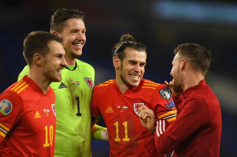 CARDIFF, WALES - NOVEMBER 19: Aaron Ramsey of Wales , Wayne Hennessey of Wales , Gareth Bale of Wales and Chris Gunter of Wales celebrate after the final whistle during the UEFA Euro 2020 qualifier between Wales and Hungary so at Cardiff City Stadium on November 19, 2019 in Cardiff, Wales. (Photo by Harry Trump/Getty Images)