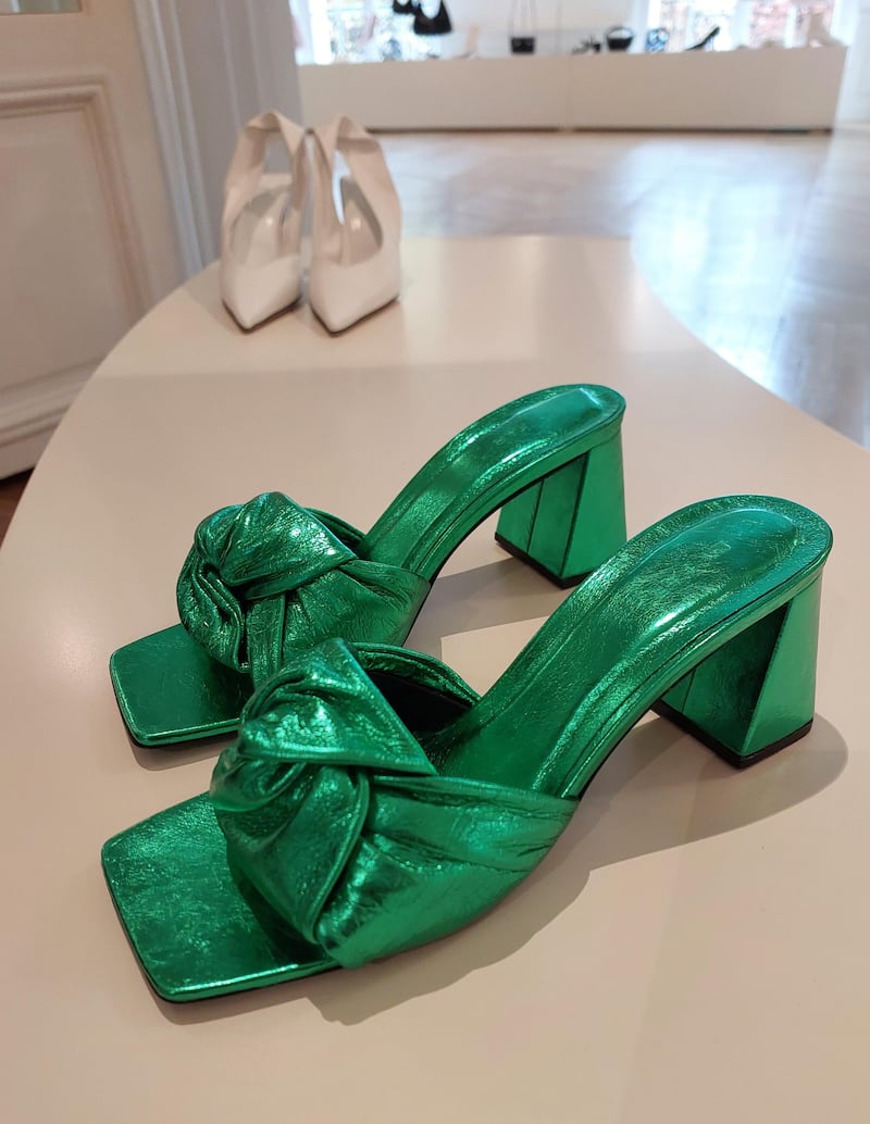 Metallic mules with a chunky heel, for spring/summer 2023, at By Far.