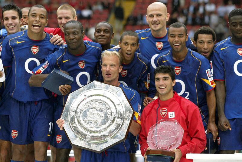 Seen with Dennis Bergkamp, Reyes helped Arsenal win the Premier League, FA Cup and Community Shield titles. Action Images