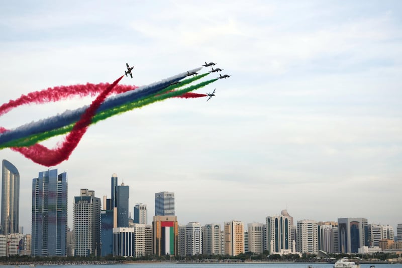 Abu Dhabi, United Arab Emirates - Al Fursan aerobatic demonstration lights up the skyline of Abu Dhabi on December 2, 2018. (Khushnum Bhandari/ The National)
