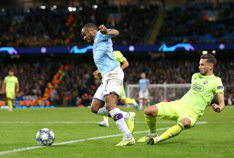 Manchester City forward Raheem Sterling of is tackled by Dinamo Zagreb's Petar Stojanovic. Getty Images