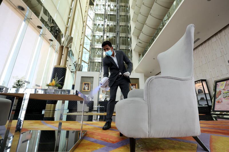Dubai, United Arab Emirates - Reporter: N/A. News. Coronavirus/Covid-19. An employee at The Meydan Hotel sanitises the reception area to prevent the spread of Covid-19. Monday, October 26th, 2020. Dubai. Chris Whiteoak / The National