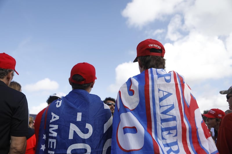 Supporters of President Donald Trump arrive to hear his campaign speech four days before Election Day in Tampa, Florida. AFP